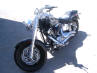 http://autosource.biz/pics/Salvage_Harley_Fatboy_Motorcycles_For_Sale.jpg